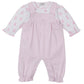 The Kissy Kissy Baby Teddy Bear Time Overall Set features a pink romper with ruffled cuffs layered over a soft white pima cotton bodysuit adorned with a sweet teddy bear print.