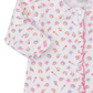 Close-up of Kissy Kissy’s Baby Girls' Sea Shell Magic Zip Footie, made from soft Pima cotton, featuring a sea shell print on white and ruffled pink trim along the zipper.