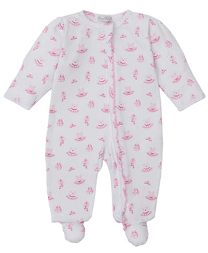 The Kissy Kissy Baby Girls' Ready to Dance Zip Footie is a white long-sleeve Pima cotton footie with footed legs, featuring a pink smiling face and sun pattern, shown laid flat on a white background.