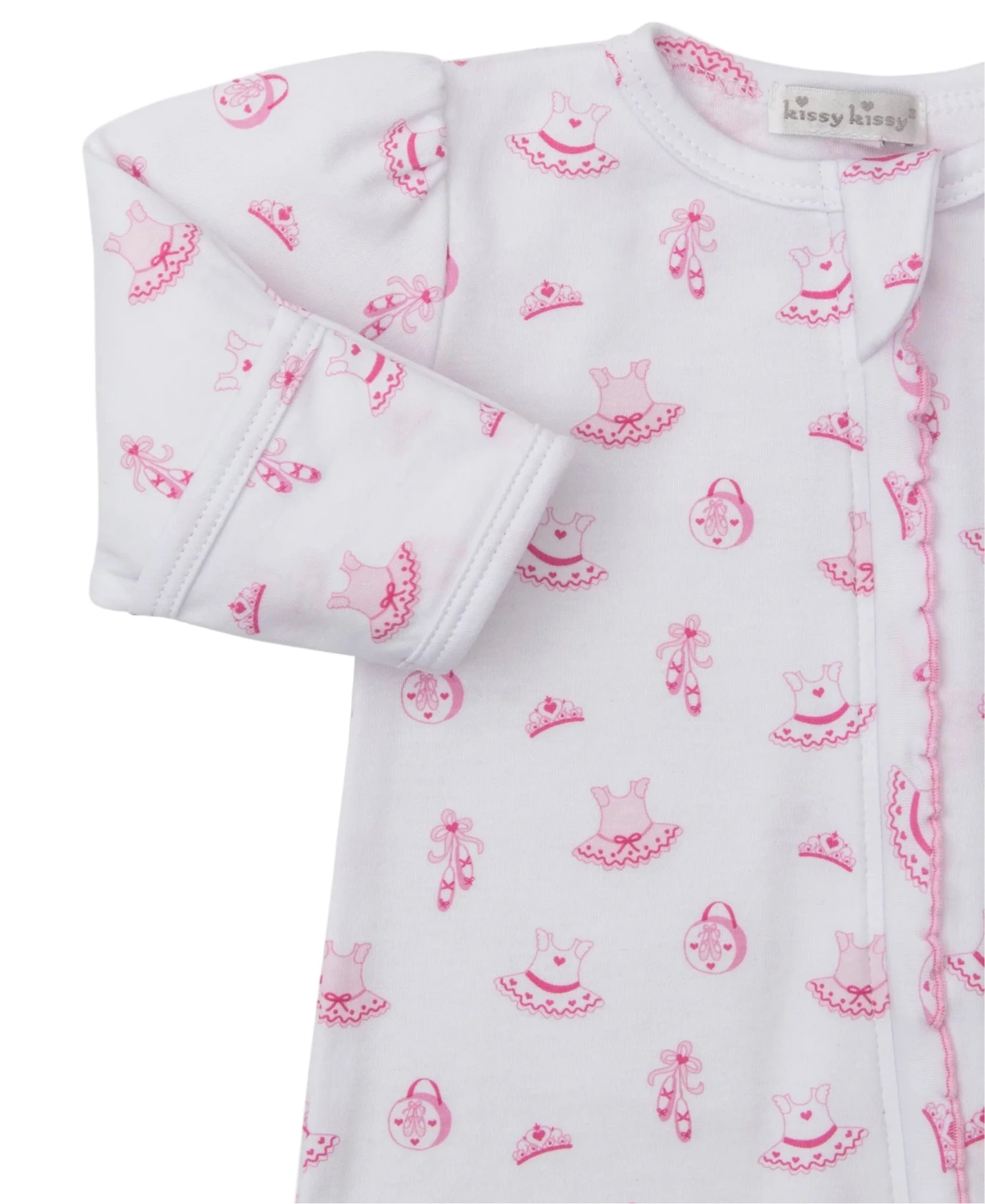 The Kissy Kissy Baby Girls' Ready to Dance Zip Footie features pink ballet dress, shoes, and purse prints on soft Pima cotton, with a zip closure and a branded collar tag.