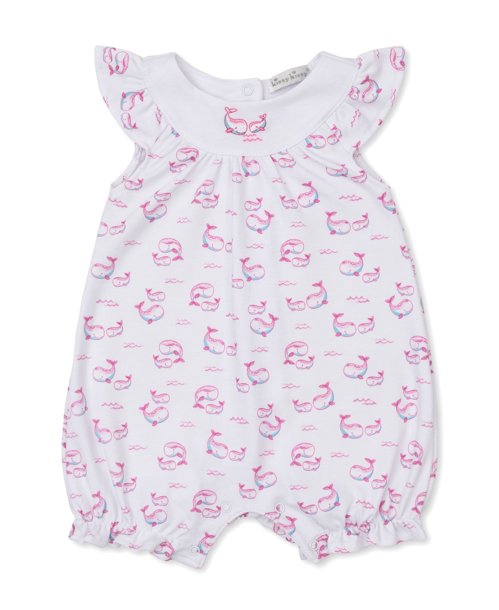 The Kissy Kissy Baby Girls' Whale Pods Playsuit, crafted from white Pima cotton and featuring flutter sleeves, a pink and blue whale pods print, and elastic leg openings, is displayed on a plain background.