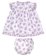 The Kissy Kissy Baby Girls' Woven Dress Set features a Pima cotton dress with lavender floral print, ruffled sleeves and hem, and a matching diaper cover, shown on a white background.