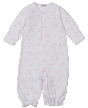 The Kissy Kissy Baby Cheerful Goodnight Convertible Gown is a white, ultra-soft Pima cotton sleeper with light pink animal and sun prints, long sleeves, elastic cuffs, front snaps, and can be worn as a gown for cozy comfort.
