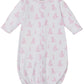 The Kissy Kissy Baby' Giraffe Grace Convertible Gown is a white, long-sleeve infant gown made from soft Pima cotton with a pink giraffe print and an elasticized hem.