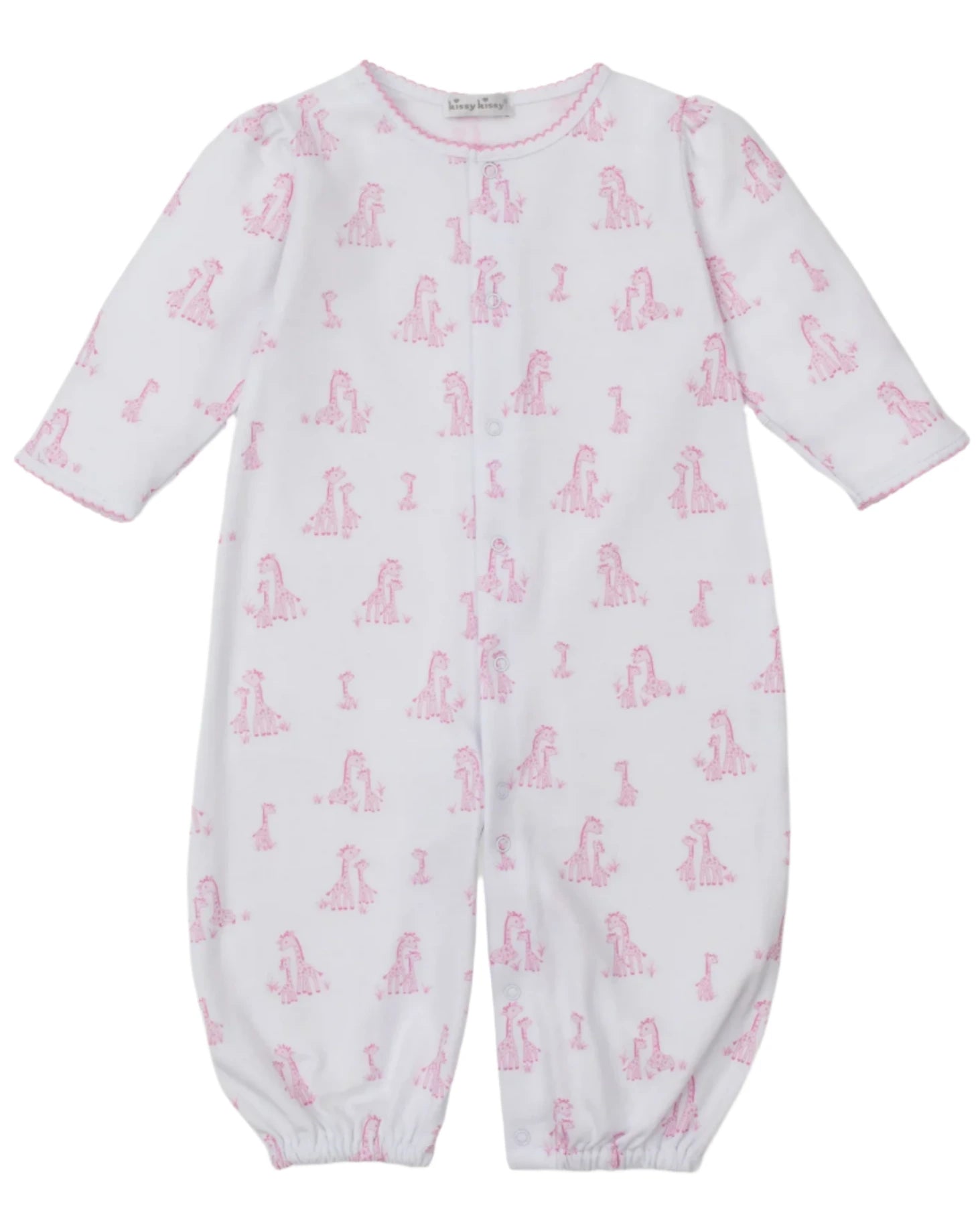 The Kissy Kissy "Baby' Giraffe Grace Convertible Gown" features soft white Pima cotton, long sleeves, a pink giraffe print, front snaps, and elasticized ankle cuffs.