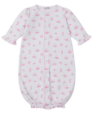 The Baby Girls' Ready to Dance Convertible Gown by Kissy Kissy features long sleeves, pink ruffle trim, an allover pink floral and umbrella print, front snaps, elasticized hem, and is made from soft Pima cotton.