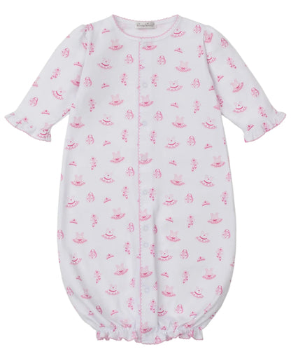 The Baby Girls' Ready to Dance Convertible Gown by Kissy Kissy features long sleeves, pink ruffle trim, an allover pink floral and umbrella print, front snaps, elasticized hem, and is made from soft Pima cotton.
