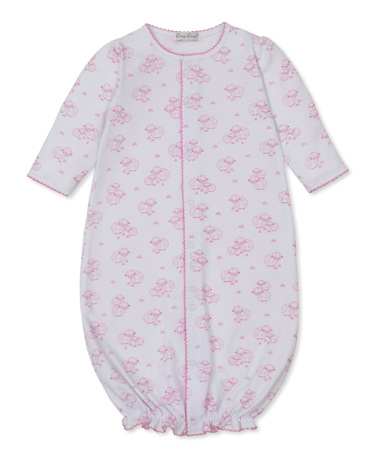 The Kissy Kissy Baby Sweet Sheep Convertible Gown is a long-sleeved white Pima cotton outfit adorned with a charming pink sheep print, featuring a gathered elastic hem and convenient front snap closure.