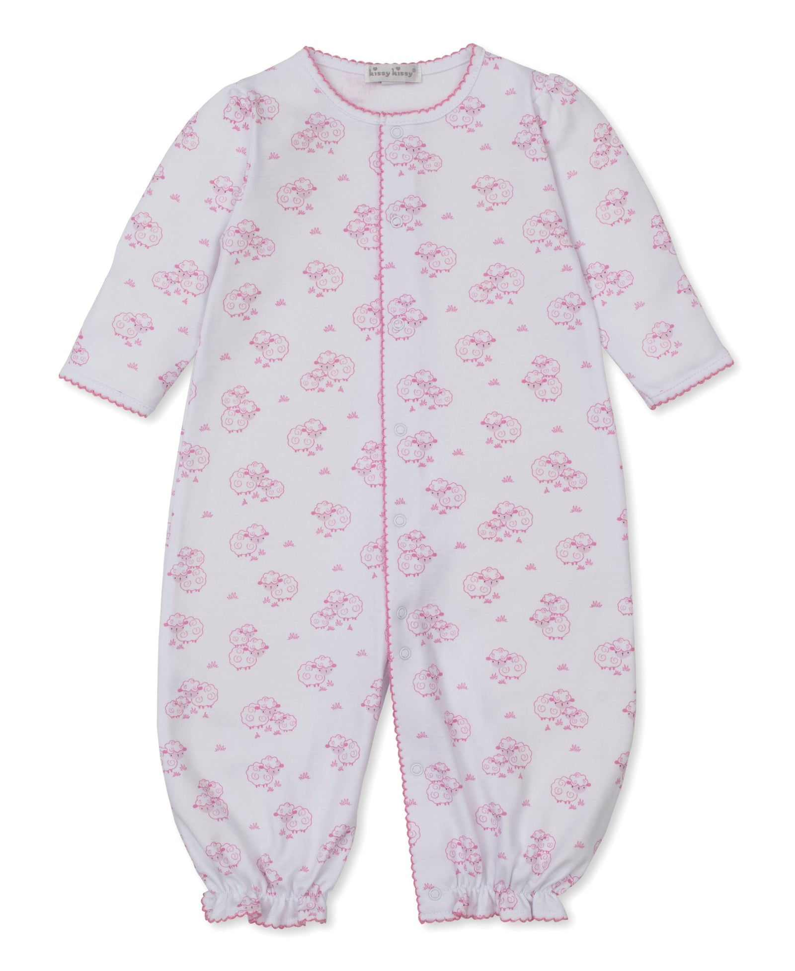 Introducing the Kissy Kissy Baby Sweet Sheep Convertible Gown: an ultra-soft Pima cotton infant sleeper in white, adorned with a pink floral pattern. Designed with front snap closures and elastic cuffs at the wrists and ankles, this long-sleeve, footless gown offers both comfort and convenience for your little one.