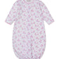 Kissy Kissy Baby Whale Pods Convertible Gown in white Pima cotton, adorned with a delightful pink whale pods print, features long sleeves, pink trim on the cuffs and collar, and an elastic bottom. The sleepwear garment is shown laid flat on a white background.