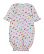 The Kissy Kissy Baby Ocean Antics Convertible Gown is crafted from soft Pima cotton and features pink sea creatures alongside a colorful floral pattern. This versatile playsuit offers long sleeves and gentle elastic at the cuffs and hem, ensuring ultimate comfort for your little one.