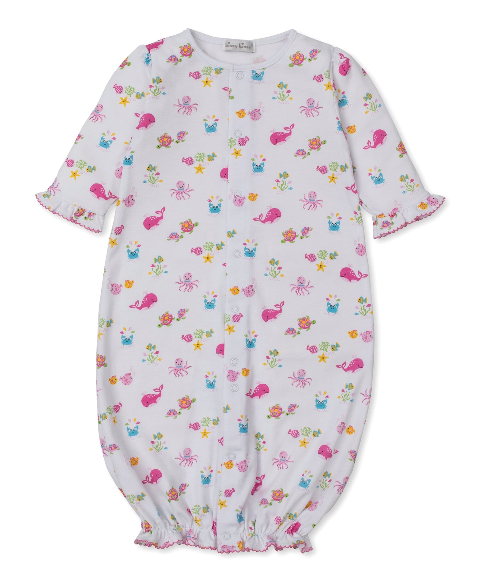 The Kissy Kissy Baby Ocean Antics Convertible Gown is crafted from soft Pima cotton and features pink sea creatures alongside a colorful floral pattern. This versatile playsuit offers long sleeves and gentle elastic at the cuffs and hem, ensuring ultimate comfort for your little one.