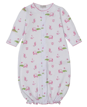 The Kissy Kissy Baby Golf Championship Convertible Gown features white Pima cotton with pink and green animal, car, and golf prints, long sleeves, front snap buttons, and elastic at the cuffs and hem.