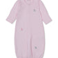 The Kissy Kissy Baby SCE Safari Party Striped Convertible Gown is a light pink, long-sleeve gown made from ultra-soft Peruvian cotton, featuring an elastic hem and small embroidered safari animals—including a giraffe, elephant, and dog—on the front.