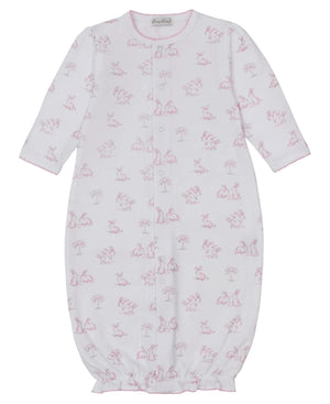 The Kissy Kissy Baby Springtime Bunny Fun Convertible Gown features soft white Pima cotton, long sleeves, pink trim, a bunny print, front snap closures, and an elasticized hem.