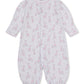 The Kissy Kissy Baby Just Giraffes Printed Convertible Gown is a white long-sleeve romper made from ultra-soft Pima cotton, adorned with a charming pink giraffe and star print. Its closed front and elasticized cuffs at the wrists and ankles provide comfort and warmth, while the versatile convertible gown design allows for easy diaper changes.