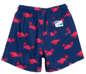 Bermies Boys' Swim Trunks featuring a red lobster print and a small, visible brand tag on the front pocket, crafted from anti-bacterial recycled polyester.