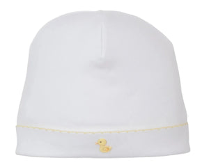 The Premier Duck Pond Paddles White Hand Emb. Hat by Kissy Kissy is crafted from soft Peruvian cotton and features a hand-embroidered yellow duck near the brim.
