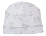 The Kissy Kissy Springtime Bunny Fun Hat is made from soft Pima cotton and showcases a light gray, sketch-style bunny and small tree print for a charming look.
