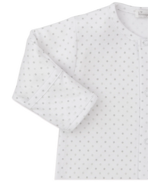 The Kissy Kissy Baby Jungle Playdate Dot Footie features light gray polka dots, snap buttons on the front, and is crafted from soft Pima cotton for ultimate comfort.