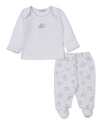 The Kissy Kissy Baby Sweet Sheep Footed Pant Set features an adorable white long-sleeve baby top with a small sheep graphic, perfectly paired with footed pants adorned in an all-over sheep print. Crafted from soft fabric with subtle stitching details, this set is the coziest choice for baby clothes.