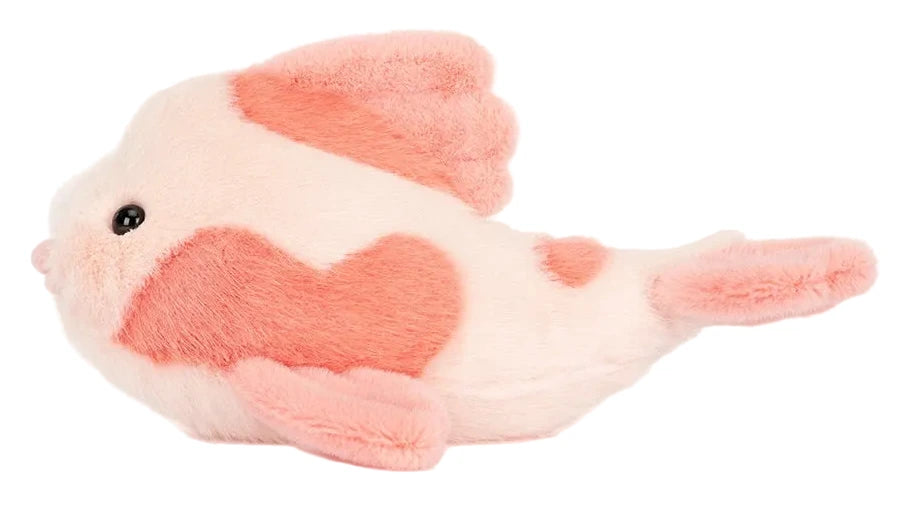 The Jellycat Fancy Carp is a plush toy shaped like a fish, with soft pink and white fur and heart-shaped pink patches—a charming accent inspired by refined style furniture.