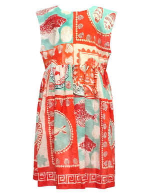 Girls' Piper Dress by Hunter Bell NYC, designed in a sleeveless fit-and-flare silhouette with a gathered waist, showcases a vibrant patchwork pattern in red, turquoise, and white, adorned with playful seashell and fish motifs.