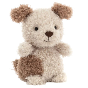 Jellycat’s Little Pup is a soft, cuddly stuffed animal with curly beige fur, brown ears, a brown patch on its back, black button eyes, and a small brown nose.