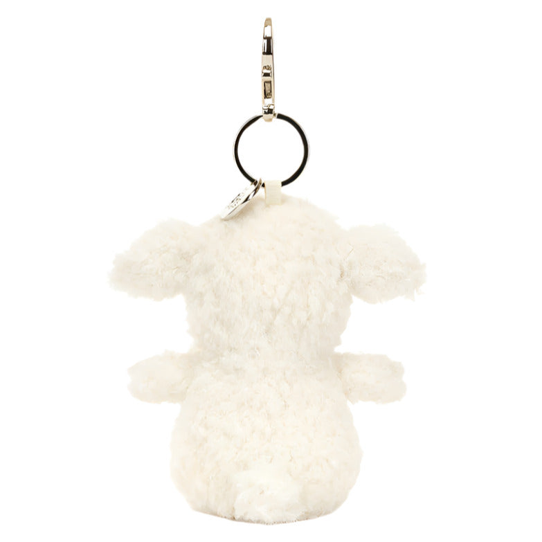 Back view of the Jellycat Little Lamb Bag Charm by Jellycat, showcasing its creamy, fluffy white fur and a metal ring on top.