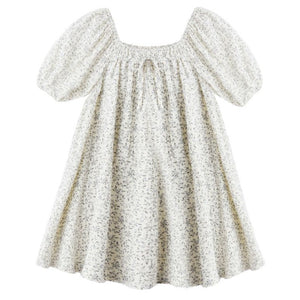 The Rylee & Cru Girls' Sabrina Mini Dress showcases a white floral print, short balloon sleeves, a smocked neckline with front tie, and a loose, flared silhouette for effortless charm.