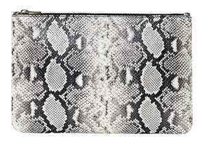 The Elly Large Pouch by Anine Bing is an oversized rectangular leather pouch with a bold black and white python print and zippered closure, shown against a white background.