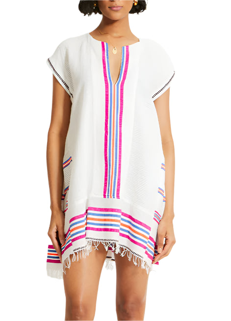 The lemlem Elina Caftan by Lemlem features a short white dress with colorful stripes and a fringed hem, showcasing the charm of tibeb weaving in an A-Line silhouette for an artisanal touch.