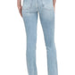 Person wearing light blue Frame Le High Straight Raw After jeans and black heels, shown from the back, with visible back pockets and raw hem at the ankles. The sustainable stretch denim gives a comfortable fit while maintaining a chic look.