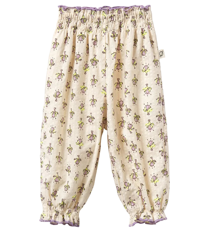 Cozmo Baby Girls' Lina Pants feature a light-colored floral print, smocked waistband, and ruffled cuffs with charming lettuce trim.