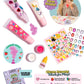 Flat lay of the Super Smalls Create Your Own Lip Gloss kit, featuring tubes, stickers, an applicator, glitter, and an instruction booklet. The image includes a smiling child decorating with stickers. Labels emphasize kid-safe ingredients and clean beauty features.