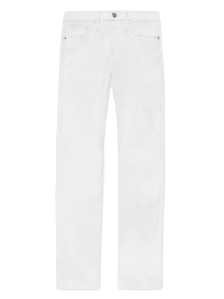 The Frame L'Homme Slim jeans feature a mid rise, straight leg, five-pocket design and button closure in white, shown against a white background.