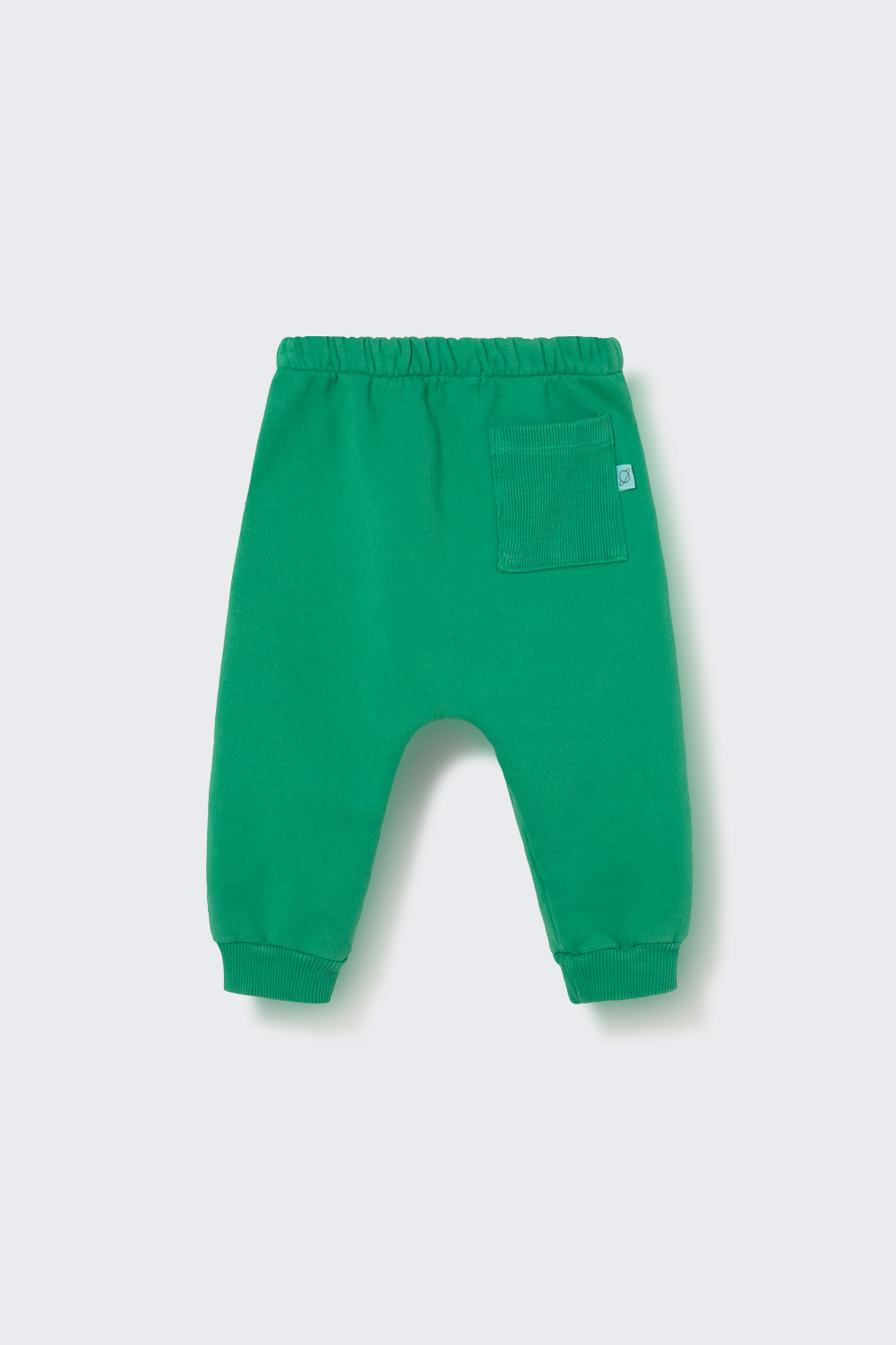 Cozmo’s Baby Louis Fleece Pants—green toddler sweatpants featuring an elastic waistband, cuffed ankles, and a single patch pocket on the back right side—are displayed on a plain light background.