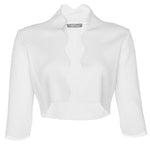 The Lela Rose Scallop Trim Knit Bolero is a white, long-sleeve shrug with an open front and wavy lapels, beautifully adorned with scalloped edges, perfect for layering over dresses or tops.