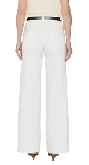Model wearing Frame's Le Slim Palazzo high-rise white wide-leg jeans, styled with a beige textured top, black belt, and heeled shoes, shown from the back against a plain background.