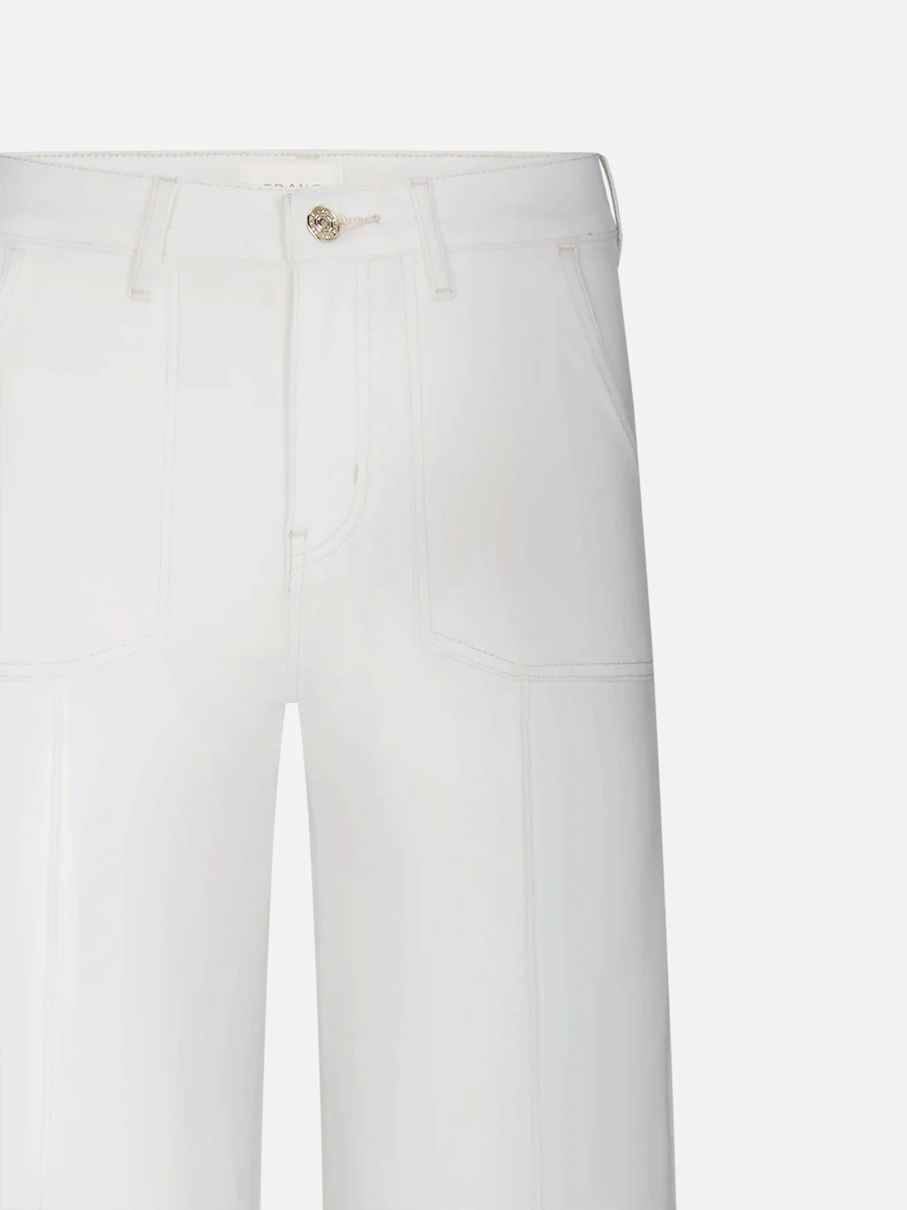 Close-up of the Le Slim Palazzo Pintuck Pocket by Frame, featuring high-waisted white pants with utility-inspired pockets, belt loops, and a button closure, showcasing a high-rise silhouette against a plain background.
