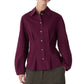 A person wearing the Lucia Top by Callas Milano—a dark purple, long-sleeve, button-front cotton poplin blouse with a collar—paired with olive green pants.