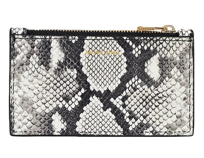 The Anine Bing Lucy Card Holder features a rectangular zippered design with a black and white python print, gold-tone zipper, and compact size; the brand name appears subtly near the top.