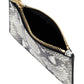 The Anine Bing Lucy Card Holder is a compact zippered pouch with a black and white snakeskin pattern and gold zipper, shown partially open and empty.