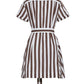 Back view of the Lagos Dress by Cara Cara, a mini shirt dress with a collared neckline, short sleeves, vertical brown and white stripes, belted waist, and short hemline.