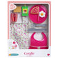 Explore the Corolle Large Mealtime Set, an enchanting toy picnic collection for your Corolle baby doll. It includes a floral bag, red cup, juice box, plate with pretend food, utensils, and a pink bib. This delightful set is presented in charming packaging to inspire countless imaginative adventures.