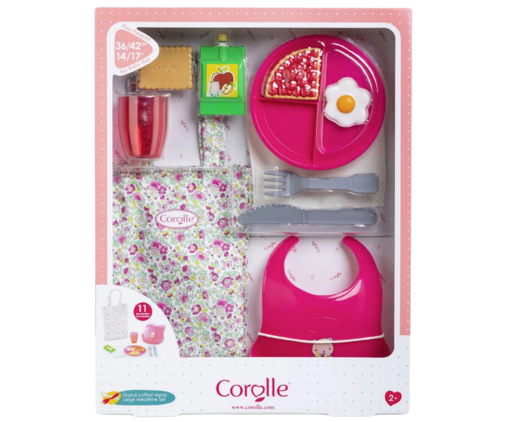 Explore the Corolle Large Mealtime Set, an enchanting toy picnic collection for your Corolle baby doll. It includes a floral bag, red cup, juice box, plate with pretend food, utensils, and a pink bib. This delightful set is presented in charming packaging to inspire countless imaginative adventures.