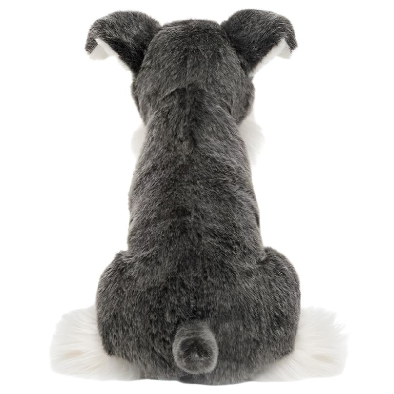 The Jellycat Lawrence Schnauzer, a plush toy dog in a sitting position, viewed from the back, with grey and white fur, perfectly captures the charming essence of a feisty schnauzer pup.