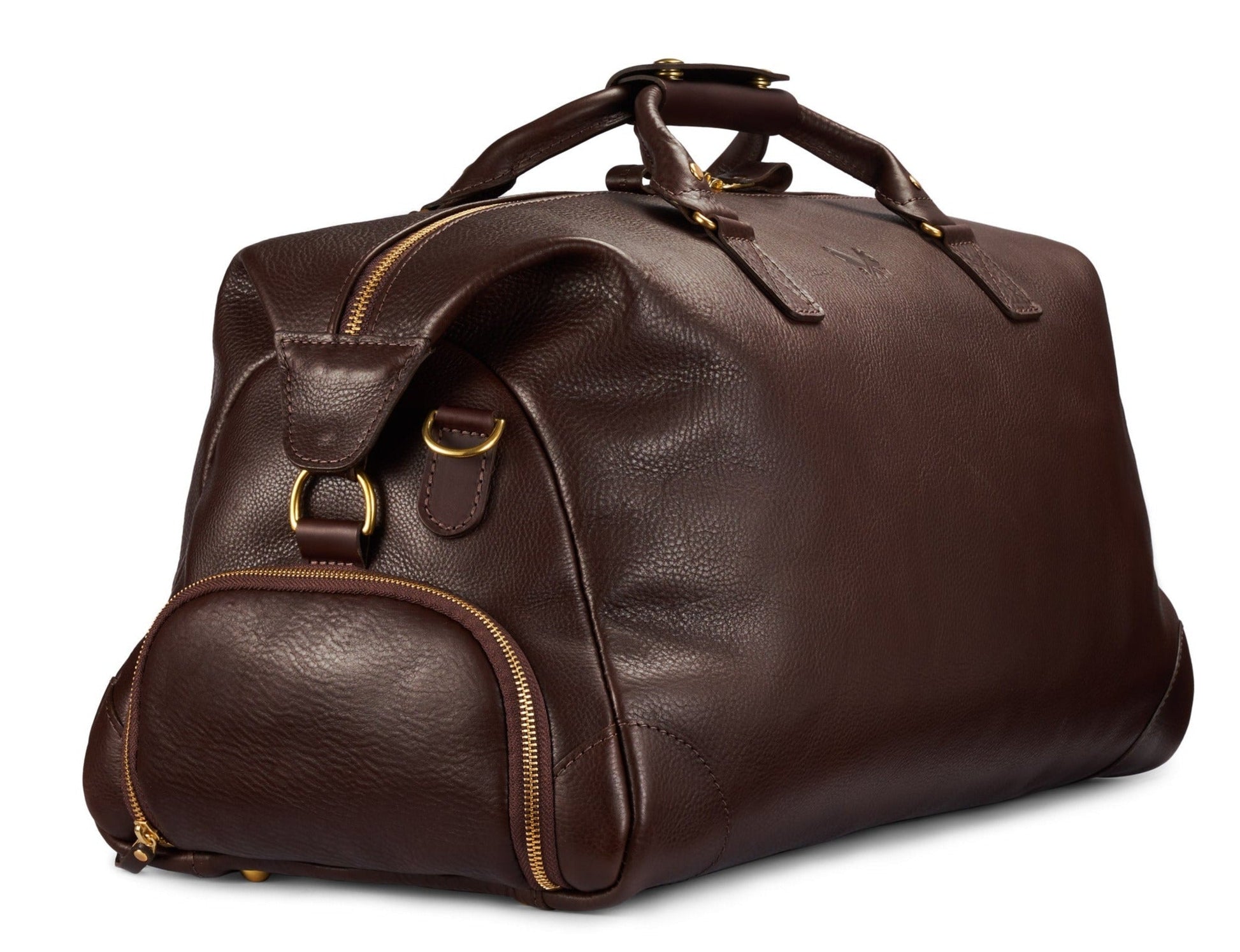 Embark on luxurious travels with the Bennett Winch Leather Weekender, crafted from full-grain leather by Bennett Winch. This spacious duffel bag features brass zippers and multiple compartments, combining style and functionality for all your journeys.