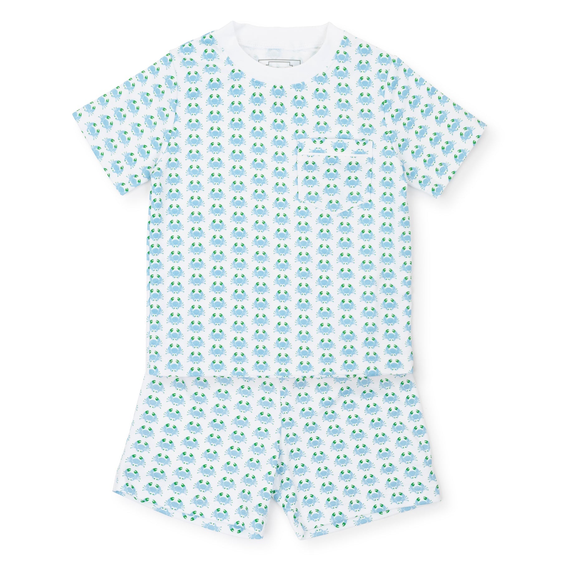 Matching white short-sleeve pajama set featuring a playful blue and green turtle pattern. Made from luxurious Peruvian Pima Cotton, the top includes a small chest pocket, while both pieces feature an elastic waistband for optimal comfort. The Lila and Hayes Boys' Charles Short Set by Lila & Hayes offers premium comfort and style.