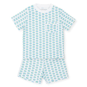 Matching white short-sleeve pajama set featuring a playful blue and green turtle pattern. Made from luxurious Peruvian Pima Cotton, the top includes a small chest pocket, while both pieces feature an elastic waistband for optimal comfort. The Lila and Hayes Boys' Charles Short Set by Lila & Hayes offers premium comfort and style.